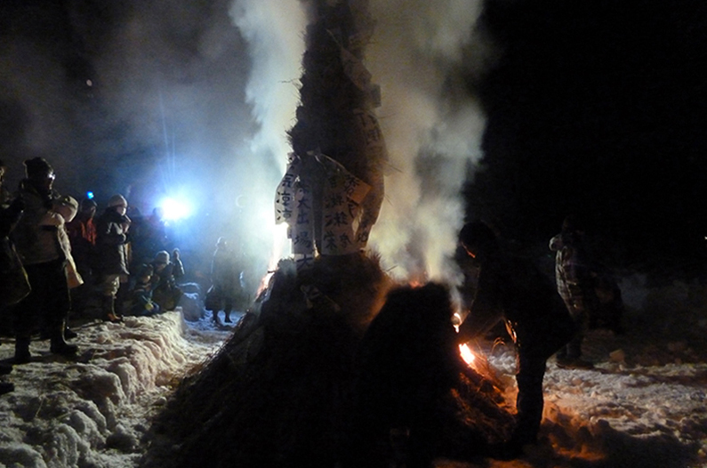 Artists starting the fires at local Sino Kami fire festival.
